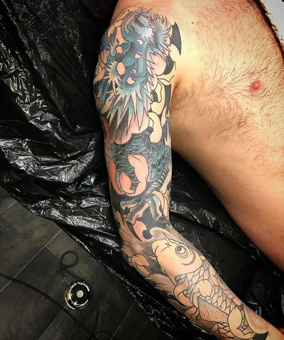 Romain Triptik tattoo 012