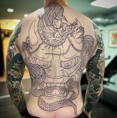 Romain Triptik tattoo 032