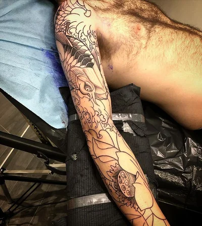Romain Triptik tattoo 033