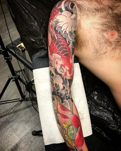 Romain Triptik tattoo 038