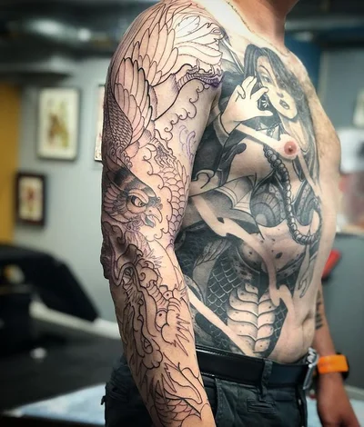 Romain Triptik tattoo 046