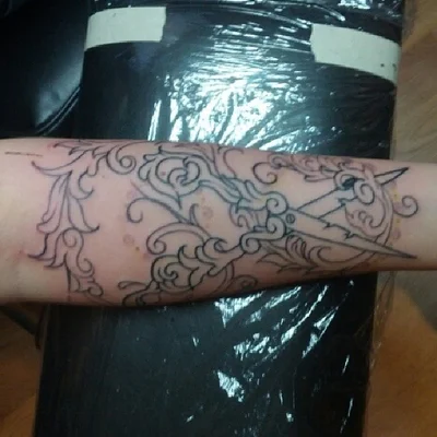 Ryan Carmichael tattoo 039
