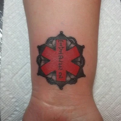 Ryan Carmichael tattoo 047