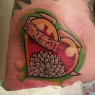 Mickey, Rhea, and Romey tattoo 007