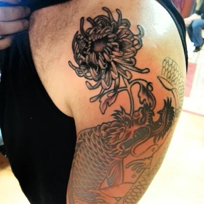 Mickey, Rhea, and Romey tattoo 019