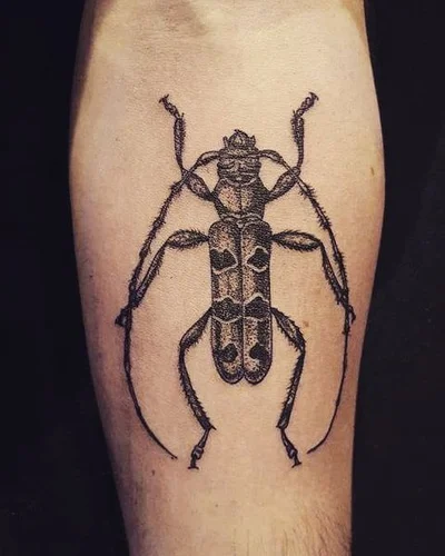 Seth Mgt tattoo 033