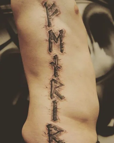 Seth Mgt tattoo 041
