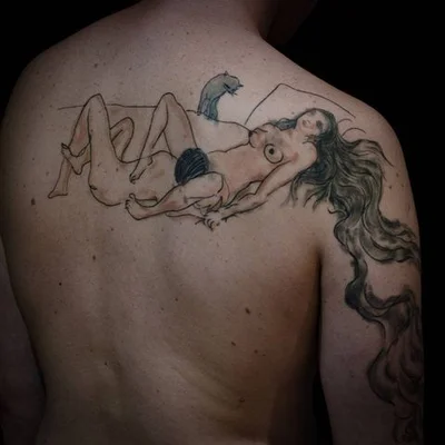 Seth Mgt tattoo 049
