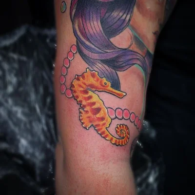 Uneq tattoo 025