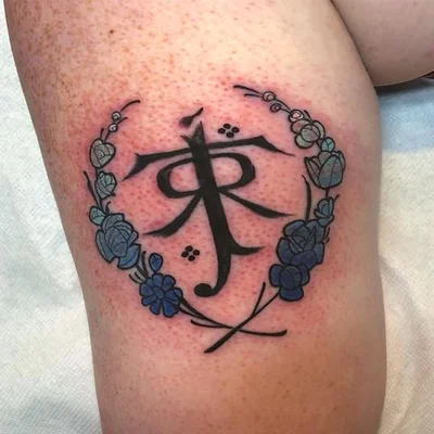 Spitting Wisdom tattoo 014