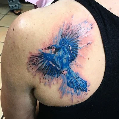 The name is 'Suitedreamztattoo' tattoo 011