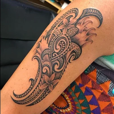 The name is 'Suitedreamztattoo' tattoo 013