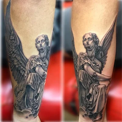 The name is 'Suitedreamztattoo' tattoo 014