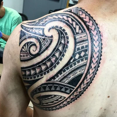The name is 'Suitedreamztattoo' tattoo 015