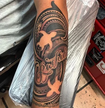 The name is 'Suitedreamztattoo' tattoo 027