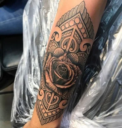 The name is 'Suitedreamztattoo' tattoo 030
