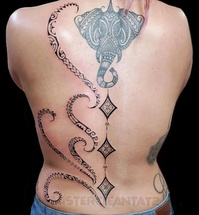 The name is 'Suitedreamztattoo' tattoo 045