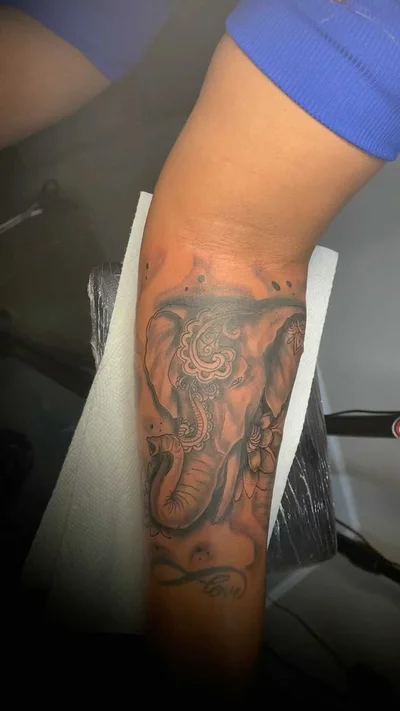 Zaire Smiler tattoo 007