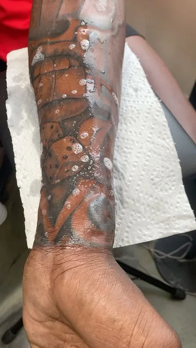 Zaire Smiler tattoo 011
