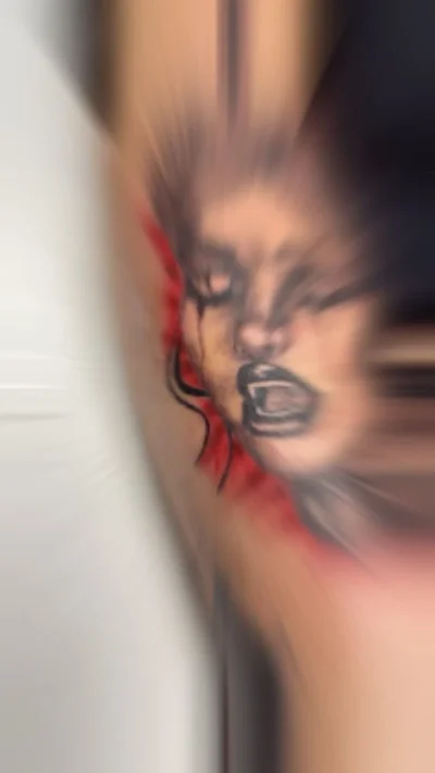 Zaire Smiler tattoo 014