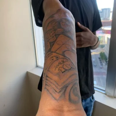 Zaire Smiler tattoo 022