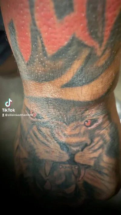 Zaire Smiler tattoo 028