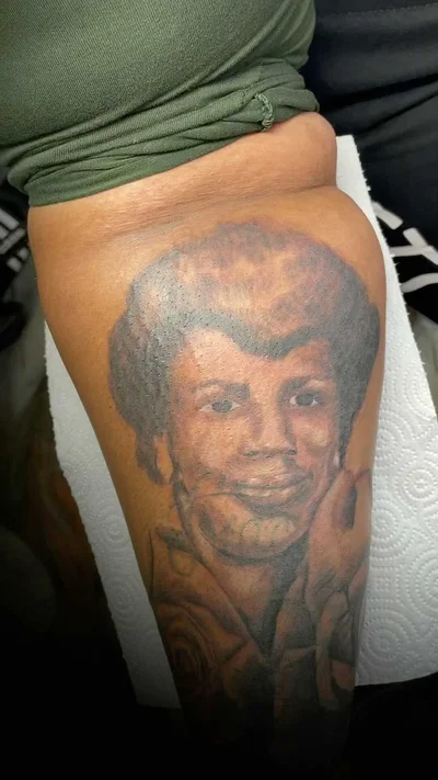 Zaire Smiler tattoo 029