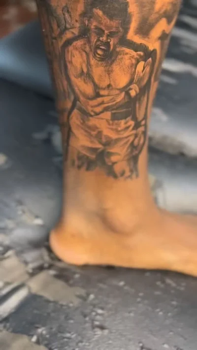 Zaire Smiler tattoo 033