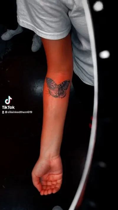 Zaire Smiler tattoo 038
