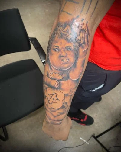 Zaire Smiler tattoo 041