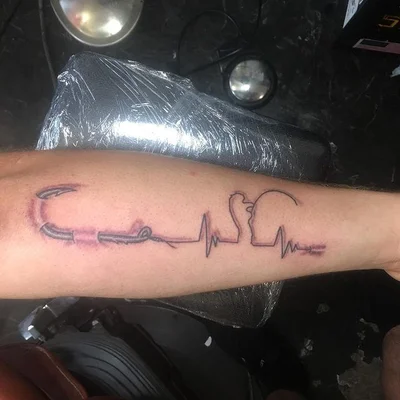 J Pettit tattoo 012