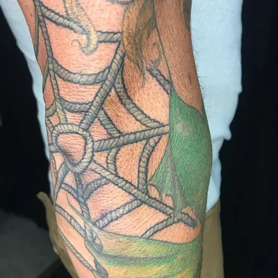 Justin Wilson tattoo 026