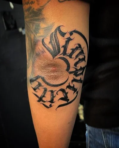 The Artistry Realm tattoo 012