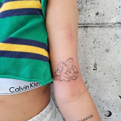 Ryan Johnson tattoo 008