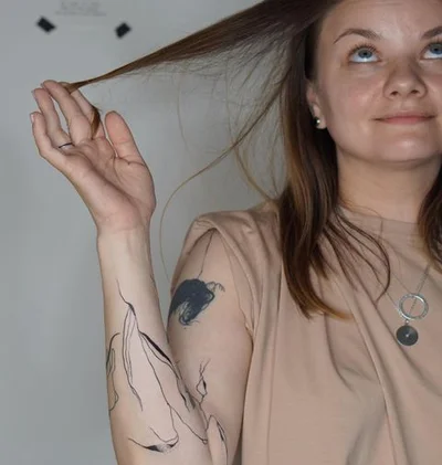 Anna Ustrehova tattoo 012